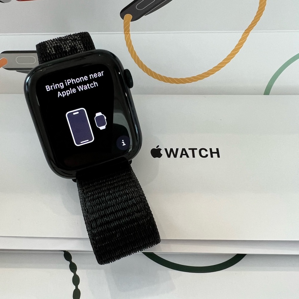 Apple Watch Series 7 45mm Midnight Aluminum Case with Nike adjustable band.
